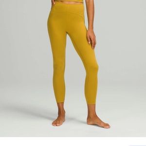 Lululemon InStill High-Rise Tight 25” in mustard yellow color size 4